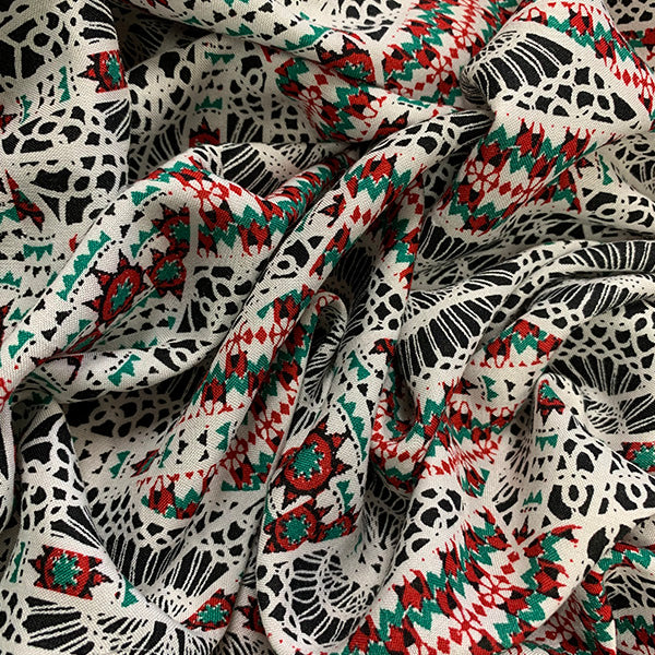 Red and Green Lace Look Print Rayon Challis Fabric