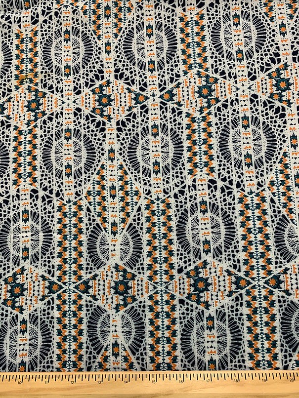Orange and Green Lace Look Print Rayon Challis Fabric