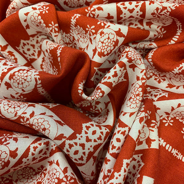 Red and White Lace Look Print Rayon Challis Fabric