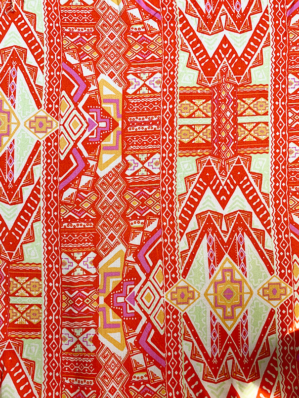 White and Orange Print Rayon Challis Fabric