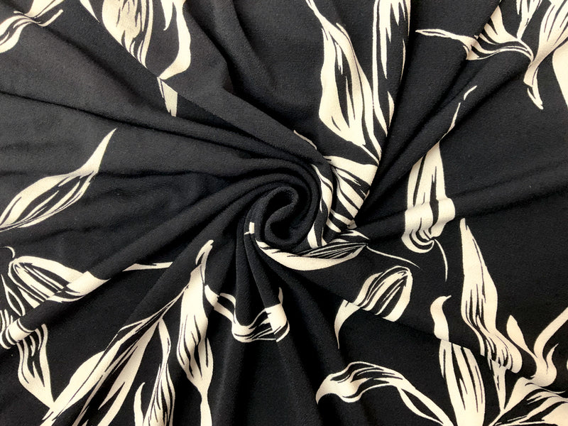 Black-Ivory Poly Leaves Border Printed ITY Moss Crepe Knit Fabric