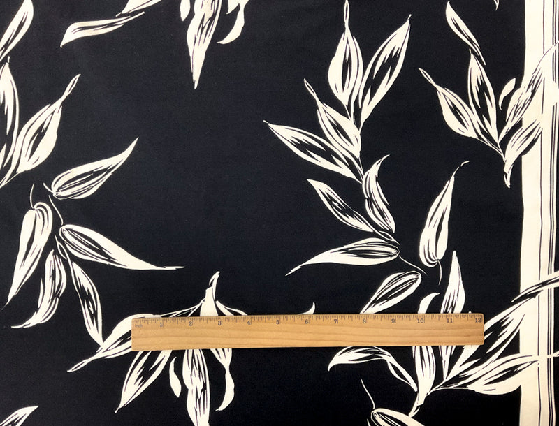 Black-Ivory Poly Leaves Border Printed ITY Moss Crepe Knit Fabric