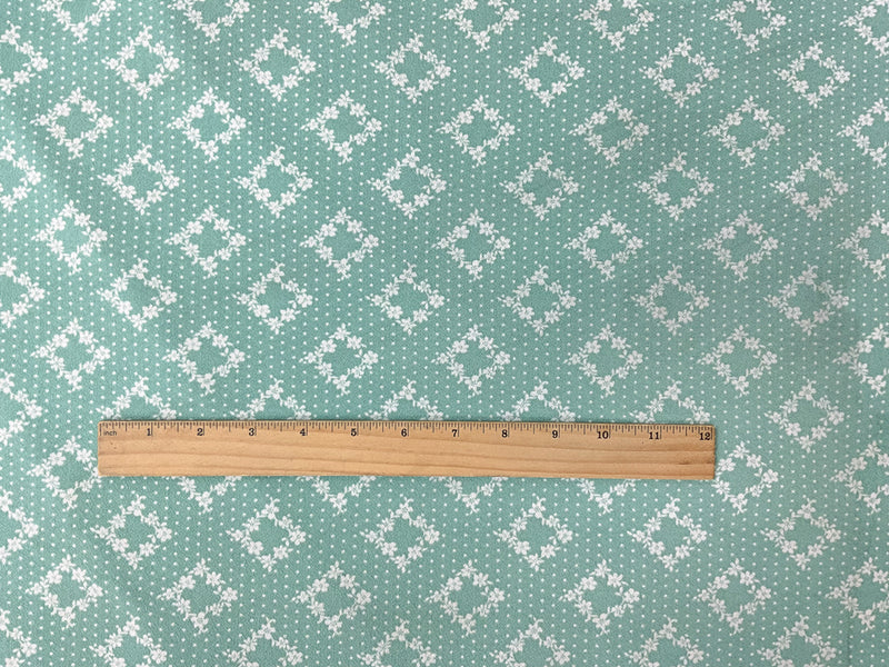 Green-Off-White Poly Floral Dot Print ITY Moss Crepe Knit Fabric