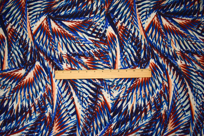Blue-Red-Multi Poly Abstract Palm Tree Printed Pebble Crepe Woven Fabric