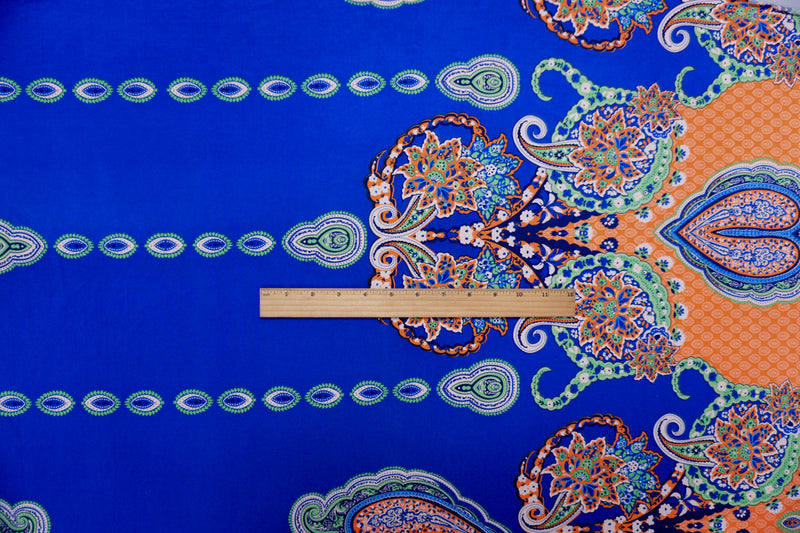 Blue-Orange-Multi Poly Stretch Paisley Border Jersey Knit Fabric