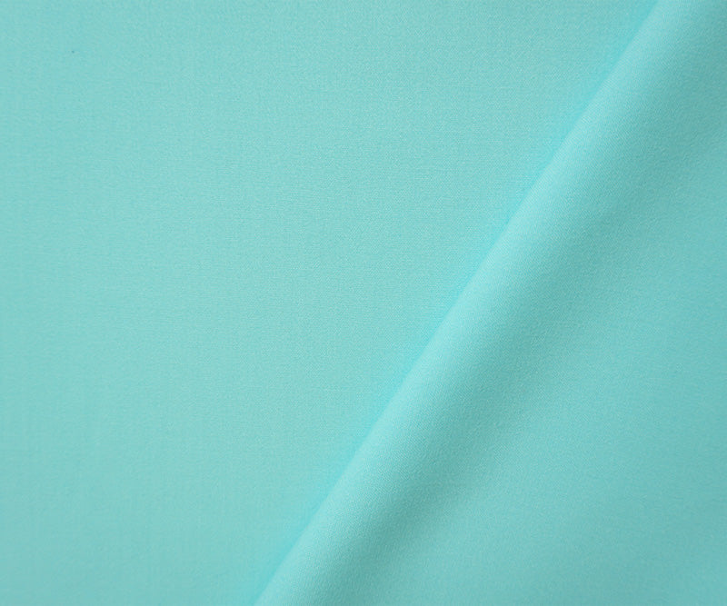 Pastel Blue Poly Rayon Spandex Stretch Solid Woven Suiting Fabric