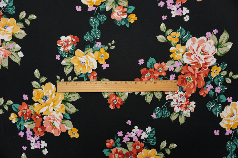 Black-Orange-Multi Poly Floral Double Brushed Jersey Knit Fabric