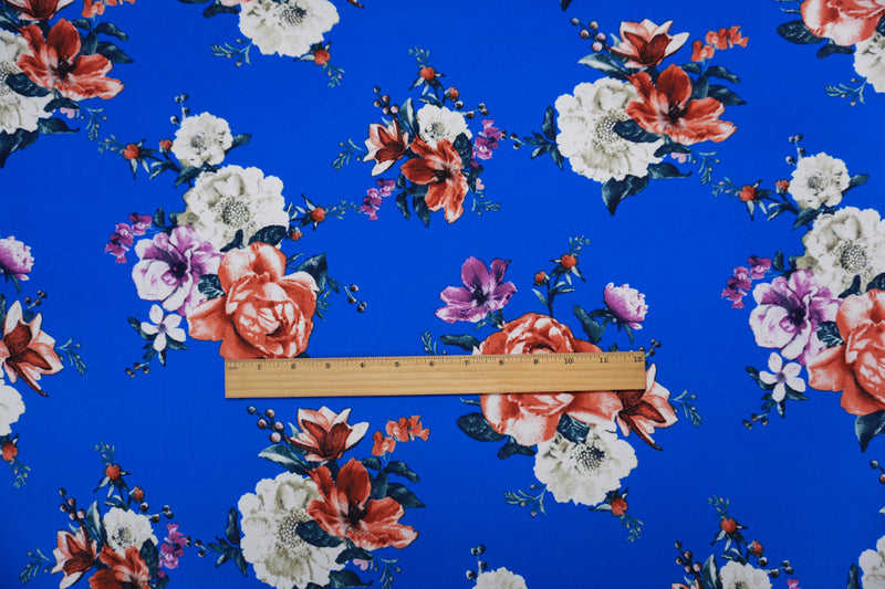 Blue-Orange-Multi Poly Floral Double Brushed Jersey Knit Fabric