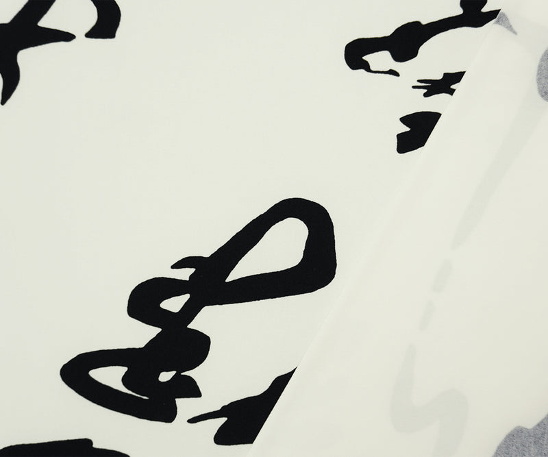 Off-White-Black Poly Calligraphy Printed ITY Jersey Knit Fabric