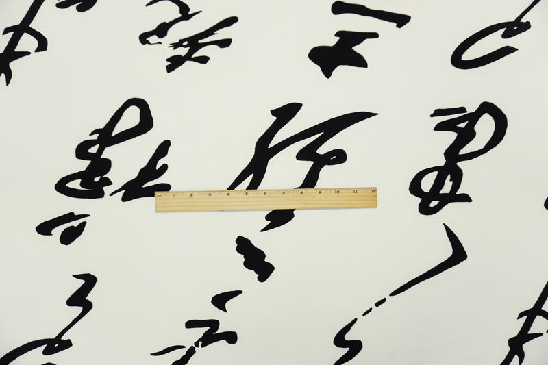 Off-White-Black Poly Calligraphy Printed ITY Jersey Knit Fabric