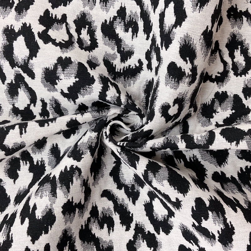 White Poly Metallic Leopard Damask Woven Fabric