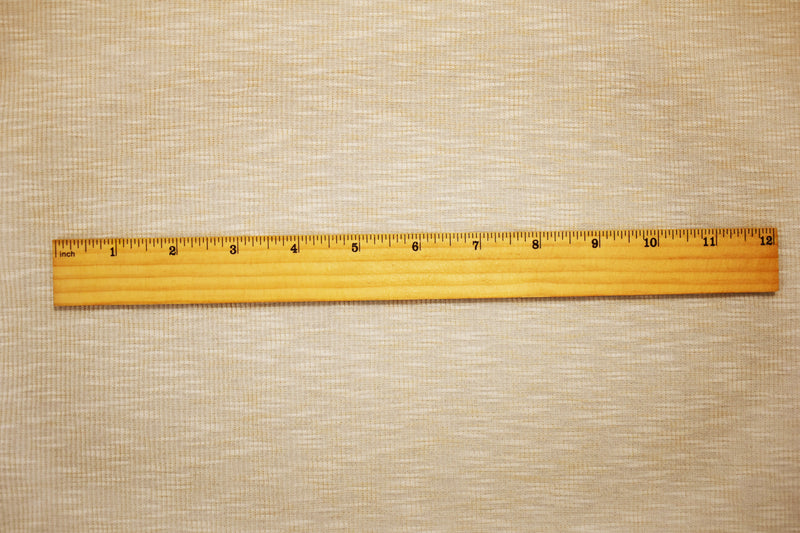Beige Poly Mechanical Stretch Slub 2X2 Rib Knit Fabric