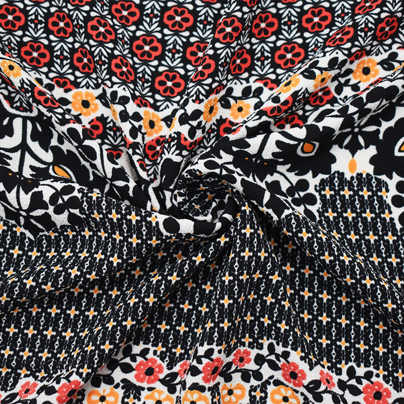 Black-Orange-Multi Poly Floral Border Printed Pebble Crepe Woven Fabric