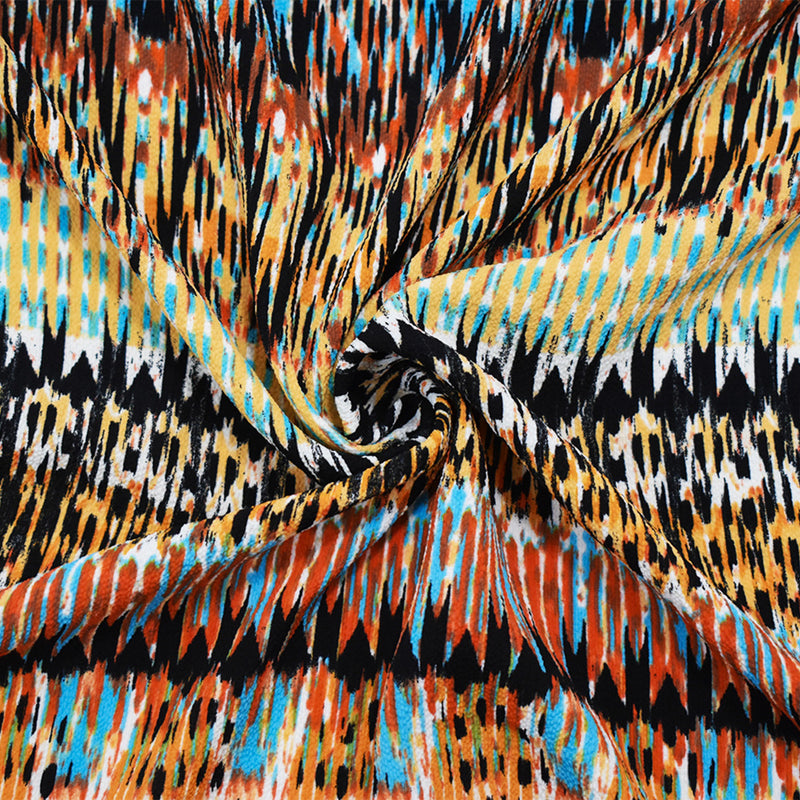Orange-Turquoise-Multi Poly Aztec Ikat Printed Pebble Crepe Woven Fabric
