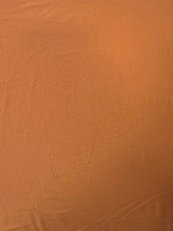 Tangerine Solid ITY Jersey Knit Fabric