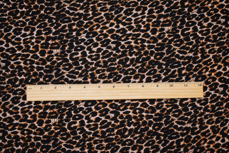 Black-Brown-Beige Polyester Cheetah Printed Matte Jersey Knit Fabric