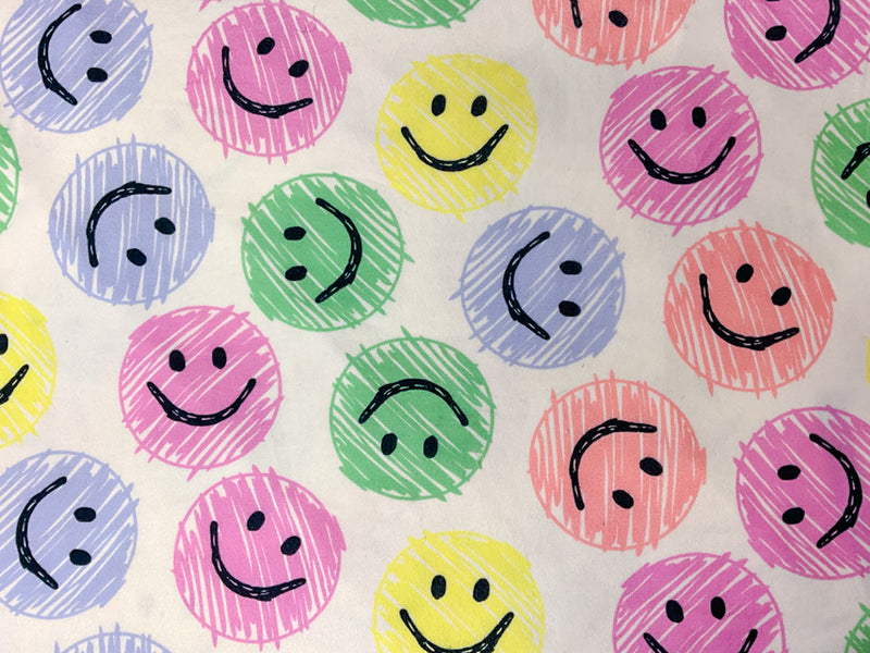 White-Pink-Multi Poly Stretch Smile Face Print Jersey Knit Fabric
