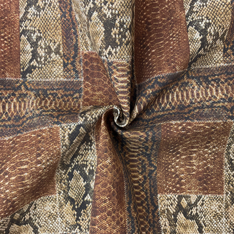 Brown-Multi 9 oz. Cotton Stretch Reptile Print Denim Woven Fabric